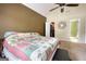 The bedroom features a ceiling fan, closet, and neutral carpet at 70 Summer Walk Dr, Covington, GA 30016