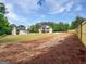 Expansive new home backyard, perfect for outdoor activities, with newly seeded grass at 1465 Leach Dr, Lawrenceville, GA 30045