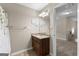 Neutral-colored bathroom with granite countertop sink and a shower/tub behind the door at 71 Pacific Ave, Sharpsburg, GA 30277