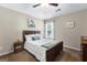 Cozy bedroom with carpet, ceiling fan and natural light at 71 Pacific Ave, Sharpsburg, GA 30277