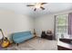 Music room with a sofa bed, amplifier, and electric piano at 71 Pacific Ave, Sharpsburg, GA 30277