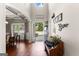 Elegant foyer boasting high ceilings, hardwood floors, and stylish decor enhancing the home's appeal at 71 Pacific Ave, Sharpsburg, GA 30277