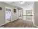Upstairs hallway with carpeted floors provides access to bedrooms and a bathroom at 71 Pacific Ave, Sharpsburg, GA 30277