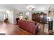 Comfortable living room with hardwood floors, fireplace, and built-in shelving at 71 Pacific Ave, Sharpsburg, GA 30277