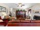 Spacious living room with hardwood floors, fireplace, and plenty of natural light at 71 Pacific Ave, Sharpsburg, GA 30277