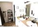 Bright bathroom featuring dual sinks, bronze fixtures and ample counter space at 300 Cloverwood Dr, Fayetteville, GA 30215
