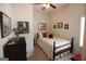Cozy bedroom with a comfortable bed, stylish decor, and natural light at 300 Cloverwood Dr, Fayetteville, GA 30215