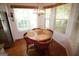 Sunlit breakfast nook featuring a round table, seating for four, and a window with views at 300 Cloverwood Dr, Fayetteville, GA 30215