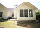 Exterior of home, showing siding, patio, and well maintained lawn at 300 Cloverwood Dr, Fayetteville, GA 30215