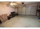 Spacious garage with concrete floor and ample storage, offering plenty of room for parking and projects at 300 Cloverwood Dr, Fayetteville, GA 30215