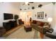 Spacious living room with high ceilings, hardwood floors, and comfortable seating at 300 Cloverwood Dr, Fayetteville, GA 30215