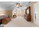 Bedroom featuring vaulted ceiling, ceiling fan, and an abundance of storage at 145 Oxford Ln, Fayetteville, GA 30215