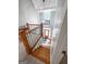 View of the foyer and staircase with wood floors and natural light at 145 Oxford Ln, Fayetteville, GA 30215