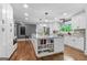 Bright, open kitchen with a large island, and stainless steel appliances at 145 Oxford Ln, Fayetteville, GA 30215