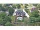 Expansive home boasts a pool, meticulous landscaping, and ample driveway space at 205 Somerset Ct, Mcdonough, GA 30253