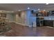 Large finished basement with a dining area and modern kitchen at 205 Somerset Ct, Mcdonough, GA 30253