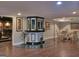 Entertaining basement space featuring a bar, dining area, and media space at 205 Somerset Ct, Mcdonough, GA 30253
