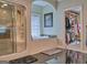 The bathroom features a glass shower, a soaking tub and access to a closet at 205 Somerset Ct, Mcdonough, GA 30253