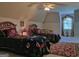 Upstairs bedroom furnished with two beds, oriental rug, and a window with blinds at 205 Somerset Ct, Mcdonough, GA 30253
