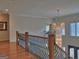 The foyer features a dramatic chandelier and a view of the home's staircase at 205 Somerset Ct, Mcdonough, GA 30253