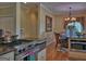 Kitchen featuring stainless steel appliances, wooden cabinets, and view of the breakfast area at 205 Somerset Ct, Mcdonough, GA 30253