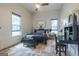 Well-lit bedroom with a queen-sized bed, stylish decor, and comfortable ambiance, perfect for relaxation at 111 S Old 27, Roopville, GA 30170