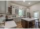 Well-equipped kitchen with stainless steel appliances, a large island, and stylish finishes at 111 S Old 27, Roopville, GA 30170