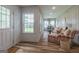 Inviting living room with lots of natural light, comfortable seating, and views of the outdoors at 111 S Old 27, Roopville, GA 30170