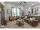 Open-concept living area seamlessly flowing into the kitchen, ideal for entertaining and modern living at 111 S Old 27, Roopville, GA 30170