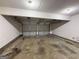 Spacious two-car garage with automatic doors and ample room for parking and storage at 257 Juliet Dr, Hampton, GA 30228