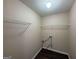 Laundry room with washer hookups and wire rack shelving at 257 Juliet Dr, Hampton, GA 30228