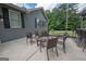 Cozy outdoor patio is ideal for entertaining and alfresco dining near home at 105 Greenfield Cir, Fayetteville, GA 30215