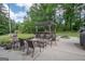 Wide patio with pergola covered dining area and bonus area for seating at 105 Greenfield Cir, Fayetteville, GA 30215