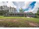 Expansive backyard perfect for outdoor activities and entertaining, and dining al fresco at 105 Greenfield Cir, Fayetteville, GA 30215