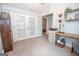 Bright room with doors and custom desk offers versatile space and natural light at 105 Greenfield Cir, Fayetteville, GA 30215
