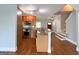 Spacious kitchen with granite countertops, stainless steel appliances, and hardwood floors at 625 Chestnut St # D, Hapeville, GA 30354