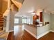Stylish kitchen with granite countertop and hardwood flooring, open to the living area at 625 Chestnut St # D, Hapeville, GA 30354
