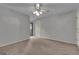 Neutral bedroom features carpet and fan with overhead lighting at 105 Gleneagles Pt, Peachtree City, GA 30269