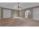 The main bedroom offers carpeted floors, a closet, a window, and neutral paint at 105 Gleneagles Pt, Peachtree City, GA 30269