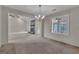 Spacious living room featuring a stone fireplace and plenty of natural light at 105 Gleneagles Pt, Peachtree City, GA 30269