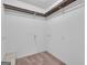 A walk-in closet with shelving and a carpeted floor at 105 Gleneagles Pt, Peachtree City, GA 30269