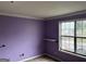 Bedroom featuring a window and a simple shelf, ready to be transformed into a cozy retreat at 621 Ridge Creek Dr, Clarkston, GA 30021