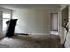 Bright living area with a treadmill, and access to a bedroom providing versatile living arrangements at 621 Ridge Creek Dr, Clarkston, GA 30021