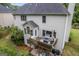 Spacious backyard offers a deck, patio, and lush greenery, perfect for entertaining and relaxing at 3924 Lorien Nw Way, Kennesaw, GA 30152