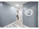 Hallway in finished basement with gray walls and white trim at 3924 Lorien Nw Way, Kennesaw, GA 30152
