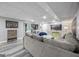 Spacious finished basement features ample seating and neutral color palette at 3924 Lorien Nw Way, Kennesaw, GA 30152