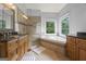 Bright bathroom featuring a tub, glass shower, double vanity, and tile flooring at 3924 Lorien Nw Way, Kennesaw, GA 30152