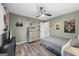 Spacious bedroom with hardwood floors, ample storage, and a light green accent wall at 3924 Lorien Nw Way, Kennesaw, GA 30152