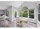 Cozy dining area with a large window offering natural light and outdoor views at 3924 Lorien Nw Way, Kennesaw, GA 30152