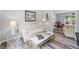 Cozy living room with stylish decor, hardwood floors, and an open doorway at 3924 Lorien Nw Way, Kennesaw, GA 30152